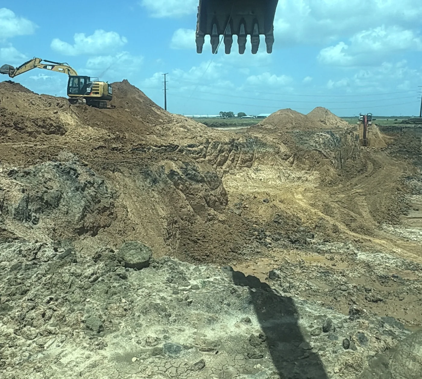 RLS excavators working sand stockpiles at the company pit in southeast Fort Bend County
